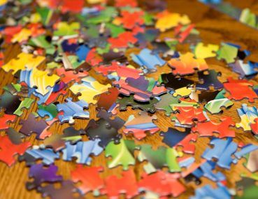 Pile of colorful puzzle pieces