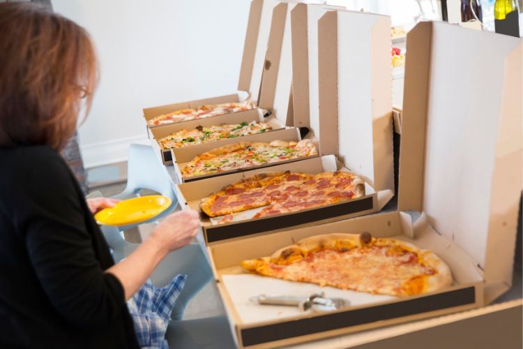 Pizza Party woman serving pizza